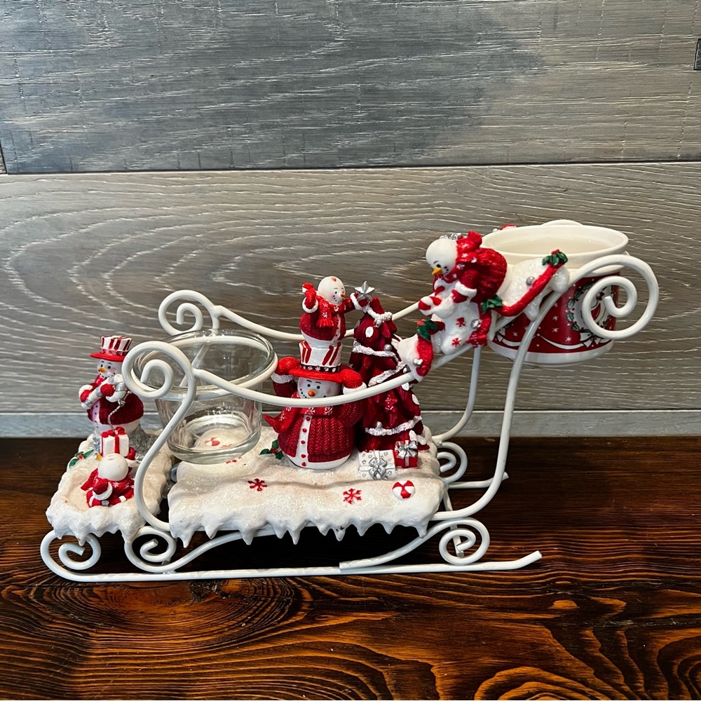 Snowman‎ sleigh candle holder